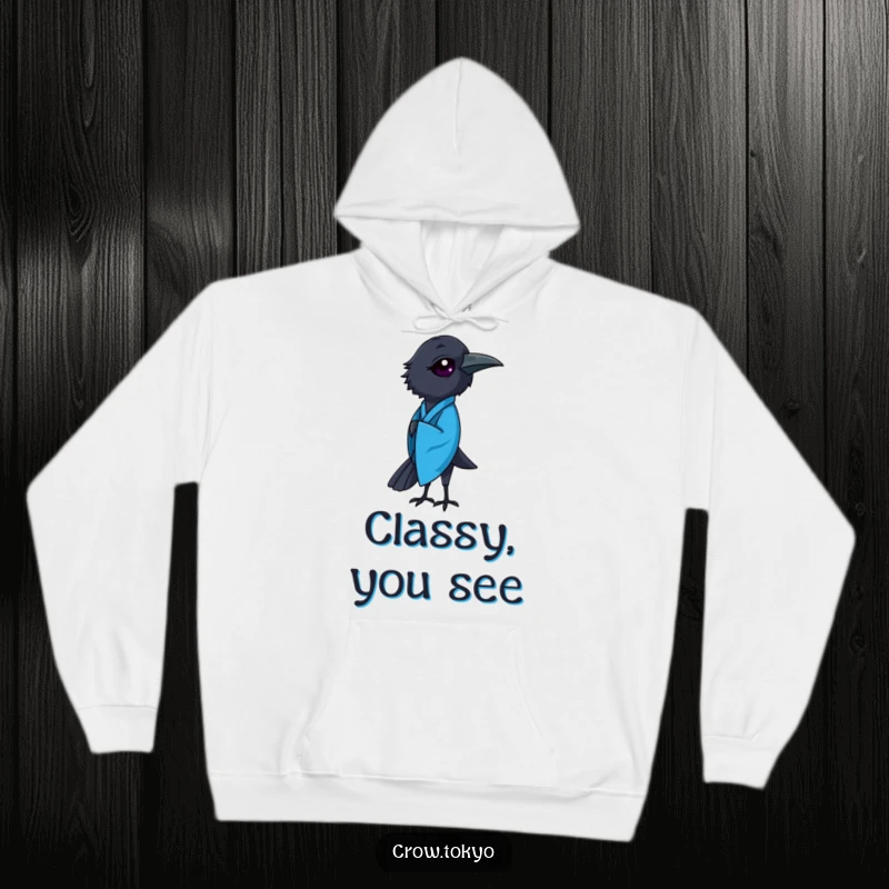 Funny hoodie featuring a distinguished crow adorned in a flowing blue kimono, executing a graceful mid-bow.